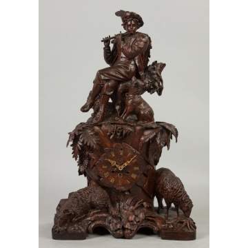 Carved Black Forest Clock with Figure Playing Flute, Dogs and Bighorn Sheep