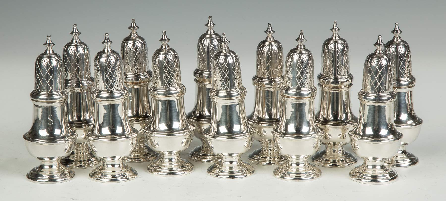 Set of 12 C.J. Vander George III Sterling Silver Castors | Cottone