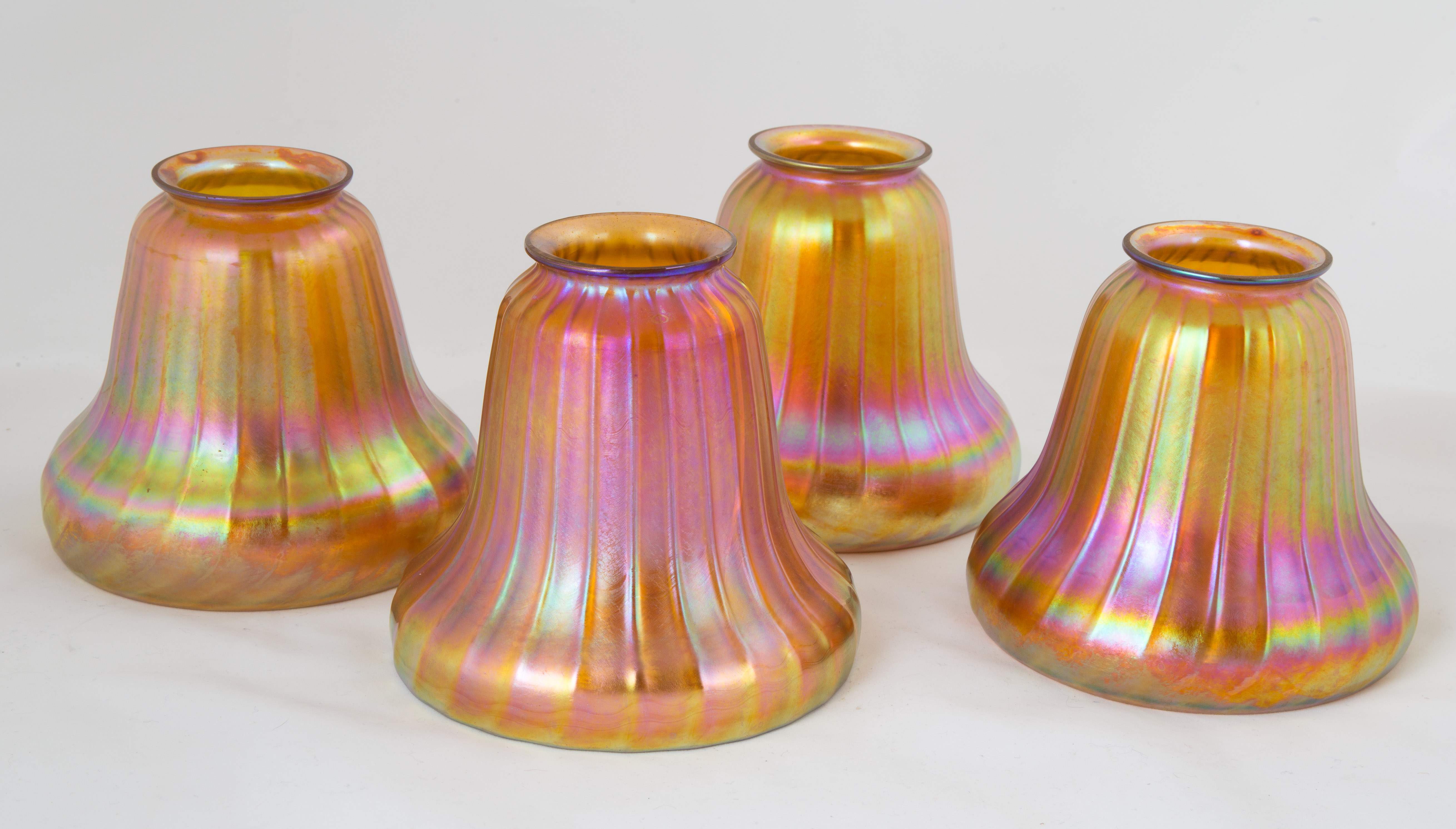 Four Steuben Gold Aurene Bell Shaped Ribbed Shades | Cottone Auctions