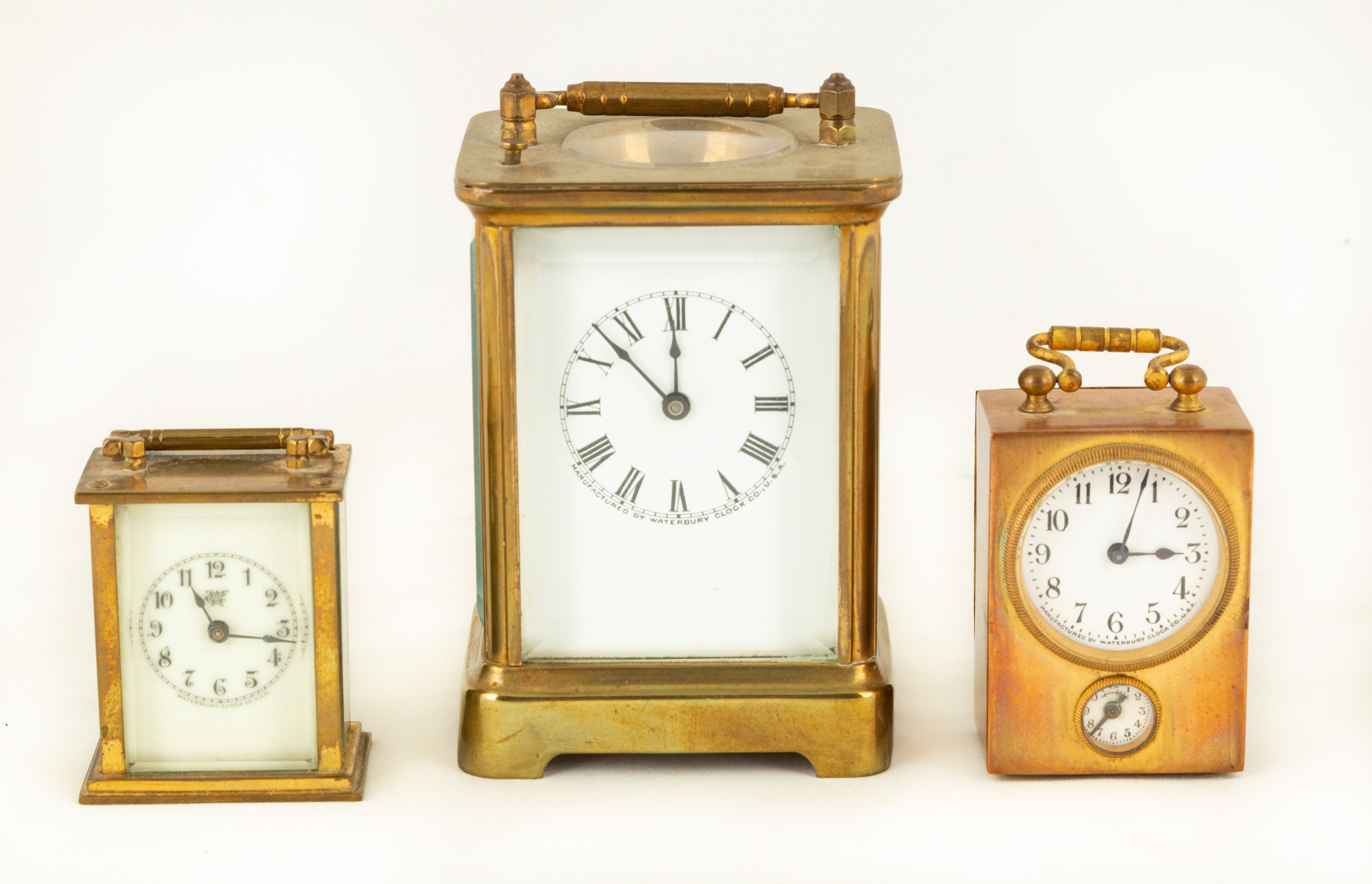 Three Waterbury Carriage Clocks | Cottone Auctions