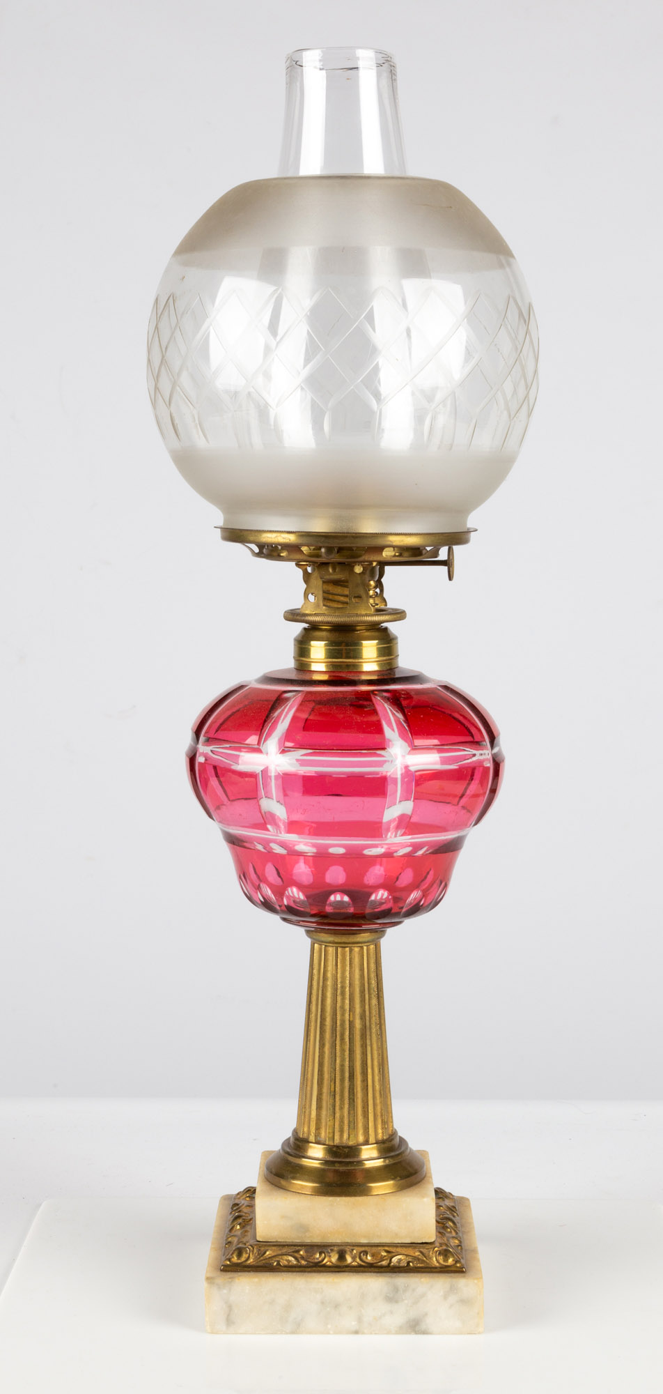 Cranberry Overlay Oil Lamp | Cottone Auctions