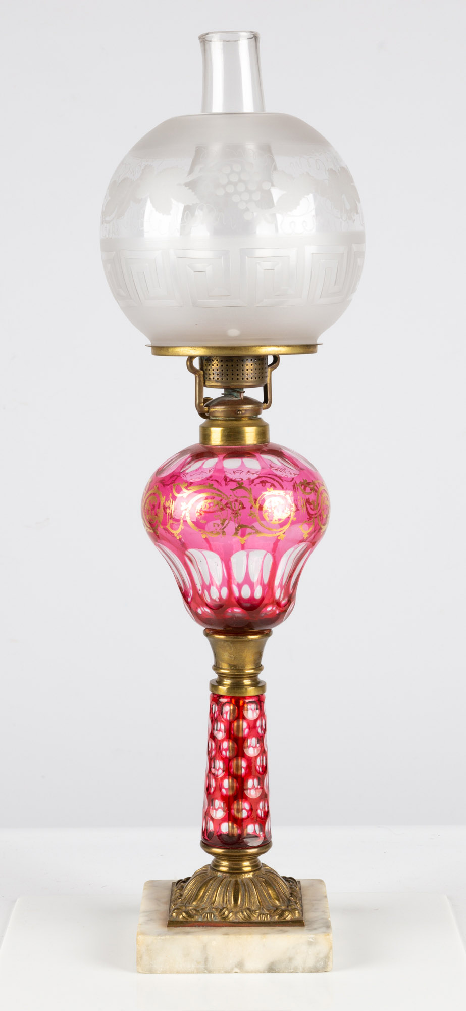 Cranberry Overlay Oil Lamp | Cottone Auctions