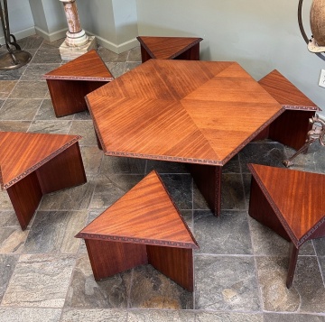 Frank Lloyd Wright (American, 1867-1969) Taliesin Cocktail Table and Six Stools