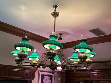 Brass Eight-Arm Chandelier with Emeralite Shades, Attributed to Bradley & Hubbard