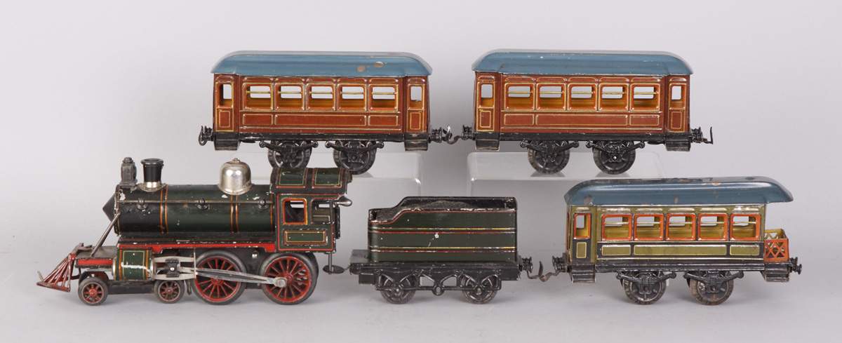 German Hand Painted Tin Clockwork Train Set | Cottone Auctions